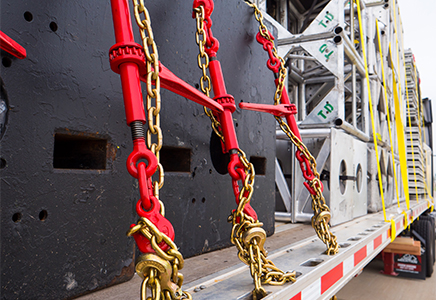 Il raccoglitore a cricchetto e la catena legante hanno reso la sicurezza del trasporto pesante.